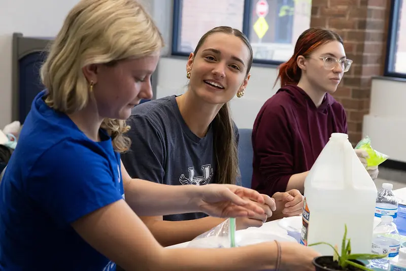 Student speaking with a classmate